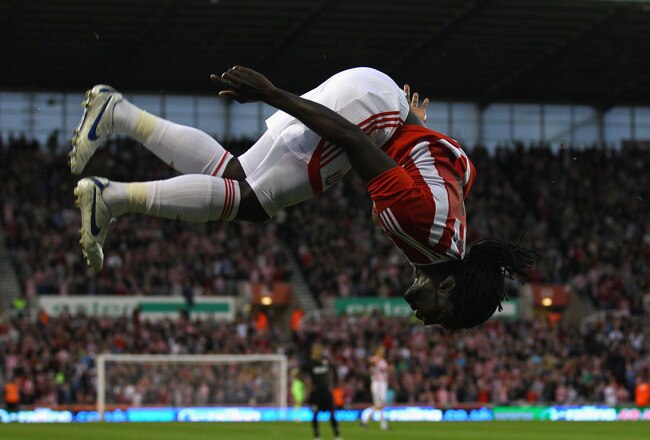STOKE, ENGLAND - AUGUST 25:  Kenwyne Jones of Stoke City celebrates after scoring the second goal during the UEFA Europa League play-off second leg match between Stoke City and FC Thun at the Britannia Stadium on August 25, 2011 in Stoke, England.  (Photo by Alex Livesey/Getty Images)