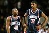 9 Dec 1998:  Guard Khalid El-Amin #42 and guard/forward Richard Hamilton #32 of the UConn Huskies confer during the game against the UMass Minutemen at Mullins Center in Amherst, Massachusetts. UConn defeated UMass 59-54. Mandatory Credit: Ezra O. Shaw  /Allsport