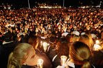 STATE COLLEGE, PA - NOVEMBER 11:  Penn State students and supporters gather for a large candlelight vigil for victims of child abuse in front of Old Main in the wake of the Jerry Sandusky scandal on November 11, 2011 in State College, Pennsylvania. Head football coach Joe Paterno was fired amid allegations that former Penn State defensive coordinator Jerry Sandusky was involved with child sex abuse. Penn State plays their final home football game against Nebraska tomorrow at Beaver Stadium.  (Photo by Mario Tama/Getty Images)
