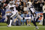 SAN DIEGO, CA - NOVEMBER 10:   Denarius Moore #17 of the Oakland Raiders makes a catch for 47 yards in front of Quentin Jammer #23 of the San Diego Chargers at Qualcomm Stadium on November 10, 2011 in San Diego, California.  (Photo by Harry How/Getty Images)