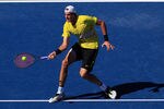 NEW YORK, NY - SEPTEMBER 09:  John Isner of the United States returns a shot against Andy Murray of Great Britain during Day Twelve of the 2011 US Open at the USTA Billie Jean King National Tennis Center on September 9, 2011 in the Flushing neighborhood of the Queens borough of New York City.  (Photo by Chris Trotman/Getty Images)