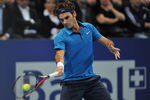 BASEL, SWITZERLAND - NOVEMBER 06:  Roger Federer of Switzerland in action during the final against Kei Nishikori of Japan on day seven of the Swiss Indoors at St Jakobshalle on November 6, 2011 in Basel, Switzerland.  (Photo by Harold Cunningham/Getty Images)