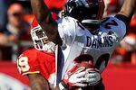 KANSAS CITY, MO - NOVEMBER 13:  Receiver Jonathan Baldwin #89 of the Kansas City Chiefs catches the ball against the back of safety Brian Dawkins #20 of the Denver Broncos during the game on November 13, 2011 at Arrowhead Stadium in Kansas City, Missouri.  The play was nullified due to a penalty.  (Photo by Jamie Squire/Getty Images)