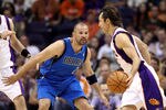 PHOENIX, AZ - MARCH 27:  Steve Nash #13 of the Phoenix Suns drives the ball past Jason Kidd #2 of the Dallas Mavericks during the NBA game at US Airways Center on March 27, 2011 in Phoenix, Arizona.  NOTE TO USER: User expressly acknowledges and agrees that, by downloading and or using this photograph, User is consenting to the terms and conditions of the Getty Images License Agreement.  (Photo by Christian Petersen/Getty Images)
