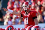 JACKSONVILLE, FL - OCTOBER 30:  Quarterback Aaron Murray of the Georgia Bulldogs points during the game against the Florida Gators at EverBank Field on October 30, 2010 in Jacksonville, Florida.  (Photo by Sam Greenwood/Getty Images)