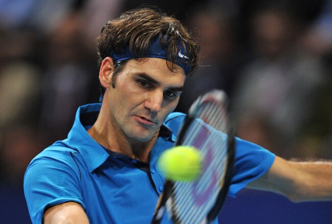 BASEL, SWITZERLAND - NOVEMBER 06:  Roger Federer of Switzerland in action during the final against Kei Nishikori of Japan on day seven of the Swiss Indoors at St Jakobshalle on November 6, 2011 in Basel, Switzerland.  (Photo by Harold Cunningham/Getty Images)