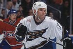 23 Jan 2002:  Center Adam Oates #77 of the Washington Capitals skates on the ice against the Montreal Canadiens during the NHL game at the MCI Center in Washington D.C.  The Canadiens defeated the Capitals 5-3.   Mandatory copyright notice: Copyright 2002 NHLI   Mandatory Credit:  Doug Pensinger/Getty Images/NHLI