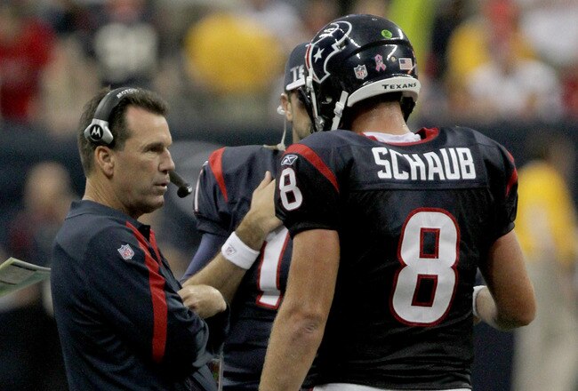 HOUSTON, TX - OCTOBER 09:  Quarterback Matt Schaub #8 talsk with head coach Gary Kubiak of the Houston Texans in the final timeout late in the fourth quarter against the Oakland Raiders on October 9, 2011 at Reliant Stadium in Houston, Texas. Raiders won 25 to 20.(Photo by Thomas B. Shea/Getty Images)
