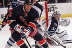 NEW YORK, NY - NOVEMBER 06: Jim Slater #19 of the Winnipeg Jets checks Sean Avery #16 of the New York Rangers at Madison Square Garden on November 6, 2011 in New York City. The Rangers defeated the Jets 3-0. (Photo by Bruce Bennett/Getty Images)