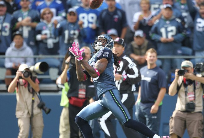 SEATTLE - OCTOBER 02:  Wide receiver Sidney Rice #18 of the Seattle Seahawks makes a touchdown catch in the first half against the Atlanta Falcons at CenturyLink Field on October 2, 2011 in Seattle, Washington. (Photo by Otto Greule Jr/Getty Images)
