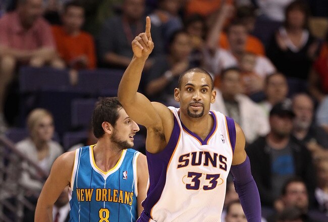PHOENIX, AZ - JANUARY 30:  Grant Hill #33 of the Phoenix Suns reacts after hitting a three point shot past Marco Belinelli #8 of the New Orleans Hornets during the NBA game at US Airways Center on January 30, 2011 in Phoenix, Arizona.  The Suns defeated the Hornets 104-102. NOTE TO USER: User expressly acknowledges and agrees that, by downloading and or using this photograph, User is consenting to the terms and conditions of the Getty Images License Agreement.  (Photo by Christian Petersen/Getty Images)