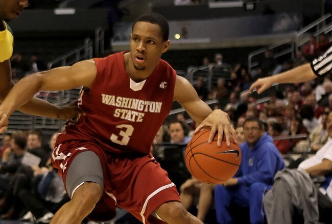LOS ANGELES, CA - MARCH 10:  Reggie Moore #3 of the Washington State Cougars is defended by Malcolm Armstead #11 of the Oregon Ducks in the first half during the first round of the Pac-10 Basketball Tournament at Staples Center on March 10, 2010 in Los Angeles, California.  (Photo by Jeff Gross/Getty Images)