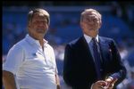 17 Sep 1989:  Dallas Cowboys head coach Jimmy Johnson (left) and owner Jerry Jones look on during a game against the Atlanta Falcons at Fulton County Stadium in Atlanta, Georgia.  The Falcons won the game, 27-21. Mandatory Credit: Allen Dean Steele  /Alls