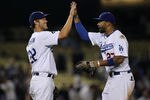 LOS ANGELES, CA - JUNE 20:  Starting pitcher Clayton Kershaw #22 and center fielder Matt Kemp #27 of the Los Angeles Dodgers celebrate after Kershaw's complete game shoutout against the Detroit Tigers on June 20, 2011 at Dodger Stadium in Los Angeles, California.  The Dodgers won 4-0.  (Photo by Stephen Dunn/Getty Images)