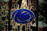 STATE COLLEGE, PA - NOVEMBER 10: On College Avenue, a crying Penn State Nittany Lion window painting marks a store front, November 10, 2011 in State College, Pennsylvania. Paterno was fired during the Penn State Board of Trustees Press Conference yesterday in the wake of a sexual abuse scandal involving former defensive coordinator Jerry Sandusky. (Photo by Patrick Smith/Getty Images)