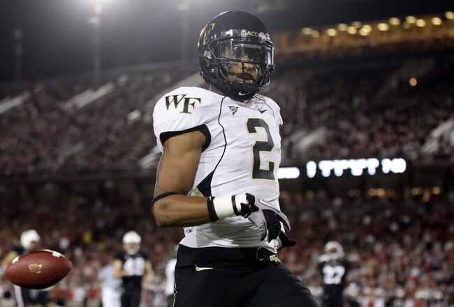 PALO ALTO, CA - SEPTEMBER 18:  Chris Givens #2 of the Wake Forest Demon Deacons runs in for a touchdown against the Stanford Cardinal at Stanford Stadium on September 18, 2010 in Palo Alto, California.  (Photo by Ezra Shaw/Getty Images)