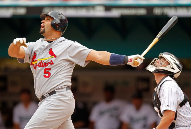 MIAMI GARDENS, FL - AUGUST 07: Albert Pujols #5 of the St. Louis Cardinals hits during a game against the Florida Marlins at Sun Life Stadium on August 7, 2011 in Miami Gardens, Florida. (Photo by Mike Ehrmann/Getty Images)