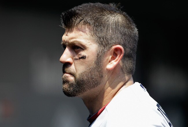 BALTIMORE, MD - JULY 20:  Catcher Jason Varitek #33 of the Boston Red Sox in action against the Baltimore Orioles at Oriole Park at Camden Yards on July 20, 2011 in Baltimore, Maryland.  (Photo by Rob Carr/Getty Images)