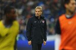 PARIS, FRANCE - NOVEMBER 11:  Coach Jurgen Klinsmann of USA looks on during a pre match training session prior to the International Friendly between France and USA at Stade de France on November 11, 2011 in Paris, France.  (Photo by Mike Hewitt/Getty Images)