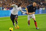 PARIS, FRANCE - NOVEMBER 11:  Jozy Altidore of USA is challenged by Jeremy Mathieu of France during the International Friendly between France and USA at Stade de France on November 11, 2011 in Paris, France.  (Photo by Mike Hewitt/Getty Images)
