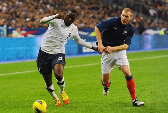 PARIS, FRANCE - NOVEMBER 11:  Jozy Altidore of USA is challenged by Jeremy Mathieu of France during the International Friendly between France and USA at Stade de France on November 11, 2011 in Paris, France.  (Photo by Mike Hewitt/Getty Images)