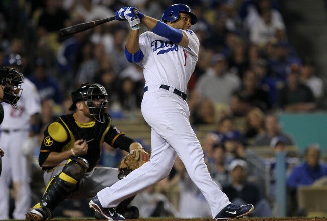 LOS ANGELES, CA - SEPTEMBER 16:  James Loney #7 of the Los Angeles Dodgers hits a pich hit three run home run in the sixth inning against the Pittsburgh Pirates on September 16, 2011 at Dodger Stadium in Los Angeles, California.   (Photo by Stephen Dunn/Getty Images)