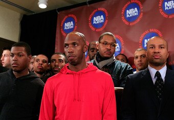 NEW YORK, NY - NOVEMBER 14: Chauncey Billups, Carmelo Anthony, and Derek Fisher, President of the National Basketball Players Association, listen as Billy Hunter, Executive Director of the National Basketball Players Association speaks at a press conference after National Basketball Players Association  met to discuss the current CBA offer at Westin Times Square on November 14, 2011 in New York City.  (Photo by Patrick McDermott/Getty Images)