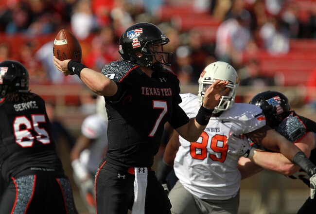 LUBBOCK, TX - NOVEMBER 12:  Seth Doege #7 of the Texas Tech Red Raiders throws against the Oklahoma State Cowboys at Jones AT&T Stadium on November 12, 2011 in Lubbock, Texas.  (Photo by Ronald Martinez/Getty Images)