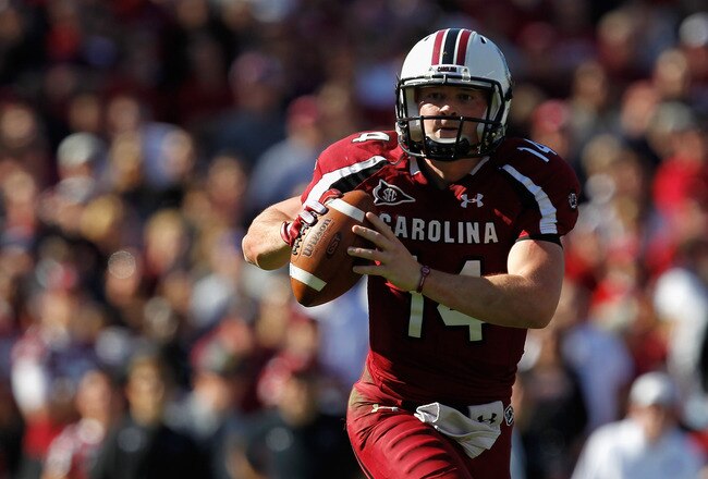 COLUMBIA, SC - NOVEMBER 12:  Connor Shaw #14 of the South Carolina Gamecocks runs with the ball against the Florida Gators during their game at Williams-Brice Stadium on November 12, 2011 in Columbia, South Carolina.  (Photo by Streeter Lecka/Getty Images)