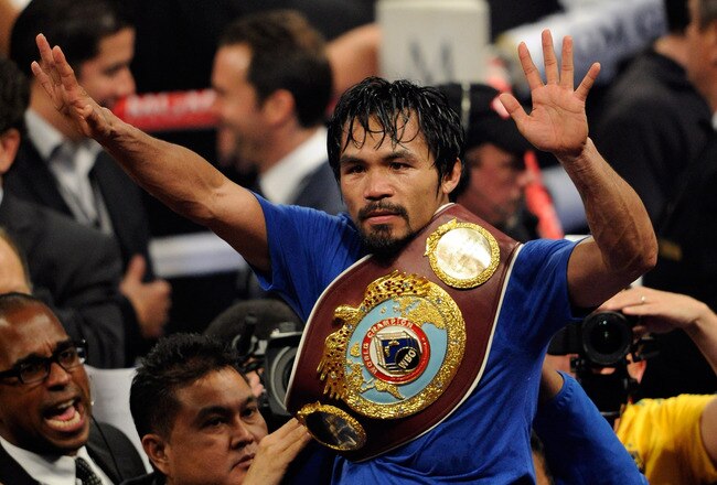 LAS VEGAS, NV - MAY 07:  Manny Pacquiao of the Philippines celebrates after his unanimous decision victory against Shane Mosley in the WBO welterweight title fight at MGM Grand Garden Arena on May 7, 2011 in Las Vegas, Nevada.  (Photo by Ethan Miller/Getty Images)