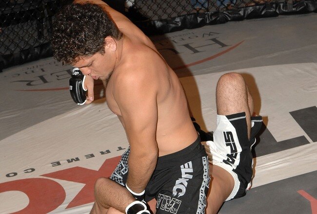 STUDIO CITY, CA - MAY 19:  MMA fighters Jake Shields (bottom) and Nick Diaz demonstrate MMA fighting techniques at CBS's 'Elite XC Saturday Night Fights' Press Conference at CBS Radford Studios on May 19, 2008 in Studio City, California.  (Photo by Stephen Shugerman/Getty Images)