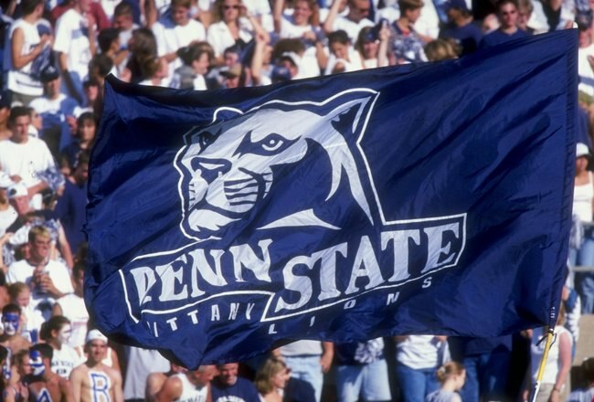 5 Sep 1998:  Penn State Nittany Lion fans hoist a flag up in the air during a game against the Southern Mississippi State Golden Eagles at the Beaver Stadium in State College, Pennsylvania. The Nittany Lions defeated the Golden Eagles 34-6. Mandatory Cred