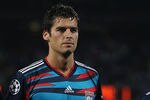 LYON, FRANCE - SEPTEMBER 14:  Miralem Pjanic (l),Yoann Gourcuff (c) and Lisandro (r) of Lyon line up before the UEFA Champions League Group B match between Olympique Lyonnais and FC Schalke 04 at the Stade de Gerland on September 14, 2010 in Lyon, France.  (Photo by Michael Steele/Getty Images)