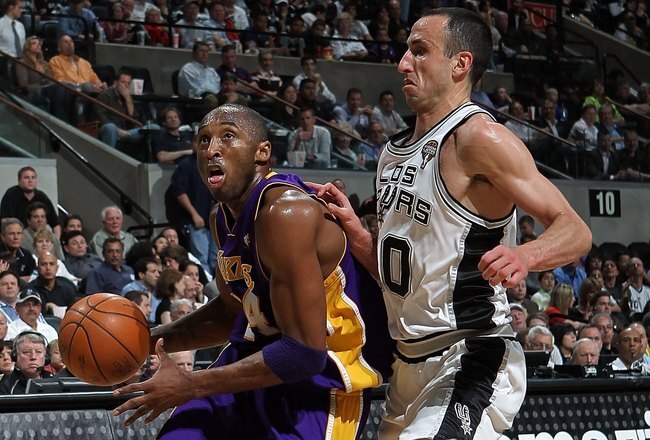 SAN ANTONIO - MARCH 24:  Guard Kobe Bryant #24 of the Los Angeles Lakers dribbles the ball past Manu Ginobili #20 of the San Antonio Spurs at AT&T Center on March 24, 2010 in San Antonio, Texas.  NOTE TO USER: User expressly acknowledges and agrees that, by downloading and/or using this Photograph, user is consenting to the terms and conditions of the Getty Images License Agreement.  (Photo by Ronald Martinez/Getty Images)