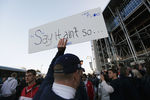 STATE COLLEGE, PA - NOVEMBER 12:   A Penn State fan carries a 'Say it ain't so' sign outside Beaver Stadium after the Penn State vs. Nebraska NCAA football game in the wake of the Jerry Sandusky scandal on November 12, 2011 in State College, Pennsylvania.  Penn State lost their final home game 17-14 to Nebraska. Penn State head football coach Joe Paterno was fired amid allegations that former Penn State defensive coordinator Jerry Sandusky was involved with child sex abuse.   (Photo by Mario Tama/Getty Images)