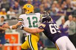 MINNEAPOLIS, MN - OCTOBER 23:  Jared Allen #69 of the Minnesota Vikings sacks Aaron Rodgers #12 of the Green Bay Packers at the Hubert H. Humphrey Metrodome on October 23, 2011 in Minneapolis, Minnesota.  (Photo by Adam Bettcher /Getty Images)