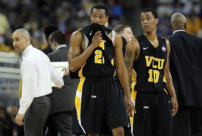 HOUSTON, TX - APRIL 02:  Bradford Burgess #20 and Darius Theus #10 of the Virginia Commonwealth Rams look on against the Butler Bulldogs during the National Semifinal game of the 2011 NCAA Division I Men's Basketball Championship at Reliant Stadium on April 2, 2011 in Houston, Texas.  (Photo by Ronald Martinez/Getty Images)