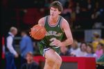 1989:  Steve Alford of the Dallas Mavericks drives the ball down the court during a game against the Denver Nuggets at McNichols Arena in Denver, Colorado. Mandatory Credit: Tim de Frisco  /Allsport