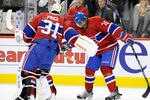 MONTREAL, CANADA - OCTOBER 26:  Carey Price #31 and P.K. Subban #76 of the Montreal Canadiens do their 'triple low-five' celebration after defeating the Philadelphia Flyers 5-1 and Price's 100th career victory during the NHL game at the Bell Centre on October 26, 2011 in Montreal, Quebec, Canada.  The Canadiens defeated the Flyers 5-1.  (Photo by Richard Wolowicz/Getty Images)