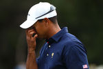 MELBOURNE, AUSTRALIA - NOVEMBER 17:  Tiger Woods of the U.S. Team reacts during the Day One Foursome Matches of the 2011 Presidents Cup at Royal Melbourne Golf Course on November 17, 2011 in Melbourne, Australia.  (Photo by Ryan Pierse/Getty Images)