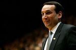 DURHAM, NC - JANUARY 2:  Head coach Mike Krzyzewski of the Duke Blue Devils smiles during their game against the Temple Owls at Cameron Indoor Stadium January 2, 2007 in Durham, North Carolina.  (Photo by Streeter Lecka/Getty Images)