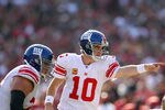 SAN FRANCISCO, CA - NOVEMBER 13:  Eli Manning #10 of the New York Giants in action against the San Francisco 49ers at Candlestick Park on November 13, 2011 in San Francisco, California.  (Photo by Ezra Shaw/Getty Images)