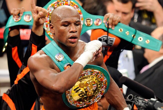 LAS VEGAS, NV - SEPTEMBER 17:  Floyd Mayweather Jr. celebrates his fourth-round knockout of Victor Ortiz to win the WBC welterweight title September 17, 2011 in Las Vegas, Nevada.  (Photo by Ethan Miller/Getty Images)
