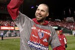 ST LOUIS, MO - OCTOBER 28:  Chris Carpenter #29 of the St. Louis Cardinals celebrates after defeating the Texas Rangers 6-2 to win Game Seven of the MLB World Series at Busch Stadium on October 28, 2011 in St Louis, Missouri.  (Photo by Ezra Shaw/Getty Images)