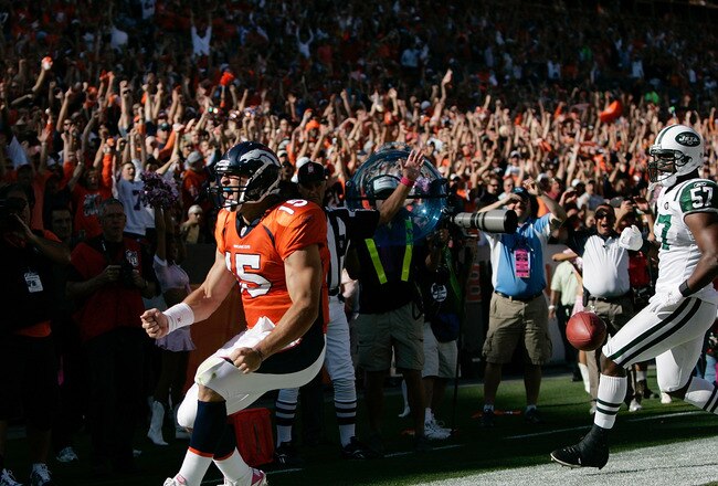 DENVER - OCTOBER 17:  Quarterback Tim Tebow #15 of the Denver Broncos celebrates his touchdown run in the first half against the New York Jets at INVESCO Field at Mile High on October 17, 2010 in Denver, Colorado.  (Photo by Justin Edmonds/Getty Images)