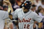 MINNEAPOLIS, MN - JUNE 28:  Gene Lamont #22 and Gerald Laird #12 of the Detroit Tigers celebrate a solo home run by Laird in the eighth inning against the Minnesota Twins during their game on June 28, 2010 at Target Field in Minneapolis, Minnesota. Tigers defeated the Twins 7-5. (Photo by Hannah Foslien/Getty Images)