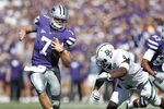 MANHATTAN, KS - OCTOBER 1: Collin Klein #7 of the Kansas State Wildcats runs with the football around the defense of Elliot Coffey #4 of the Baylor Bears at Bill Snyder Family Football Stadium on October 1, 2011 in Manhattan, Kansas. The Wildcats won 36-35. (Photo by Joe Robbins/Getty Images)