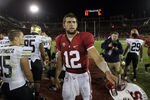 STANFORD, CA - OCTOBER 08:  Andrew Luck #12 of the Stanford Cardinal shakes hands with players from the Colorado Buffaloes after their game at Stanford Stadium on October 8, 2011 in Stanford, California.  (Photo by Ezra Shaw/Getty Images)