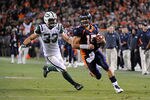 DENVER, CO - NOVEMBER 17: Tim Tebow #15 of the Denver Broncos runs for the game winning touchdown against Eric Smith #33 of the New York Jets at Sports Authority Field at Mile High on November 17, 2011 in Denver, Colorado.  (Photo by Garrett W. Ellwood/Getty Images)