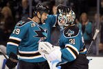 SAN JOSE, CA - NOVEMBER 07:  Joe Thornton congratulates Antti Niemi #31 of the San Jose Sharks after they beat the Los Angeles Kings at HP Pavilion at San Jose on November 7, 2011 in San Jose, California.  (Photo by Ezra Shaw/Getty Images)